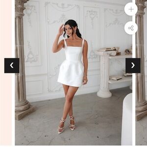 UNTAMED PETALS BY AMANDA JUDGE Elegant White Mini Dress